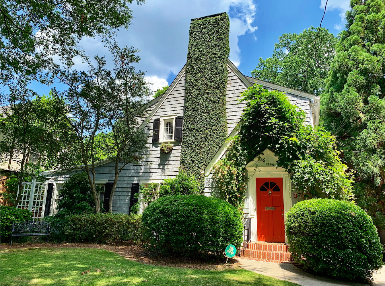 Quaint house covered in ivy.
